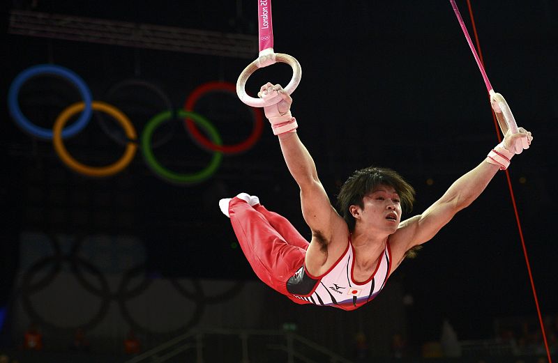 Kohei Uchimura of Japan competes in the rings during the men's individual all-around gymnastics final in London