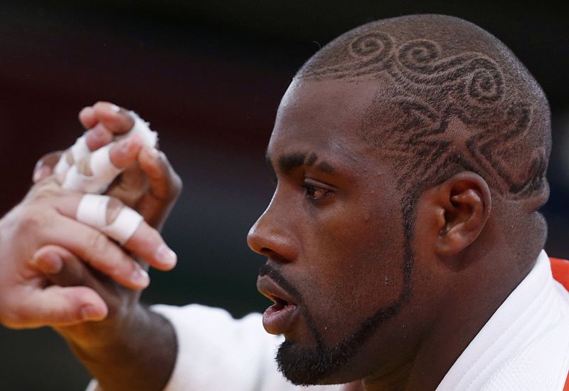 Muy espectacular el look del frnacés Teddy Riner, que se ha presentado con este pelo en su combate con el judoka polaco Janusz Wojnarowiczen la categoría más ded 100kg.