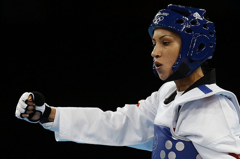 La taekwondista española Briguitte Yagüe celebra uno de sus puntos en la ronda preliminar de la categoría de -48 kilos en su combate contra la panameña Carolena Carstens