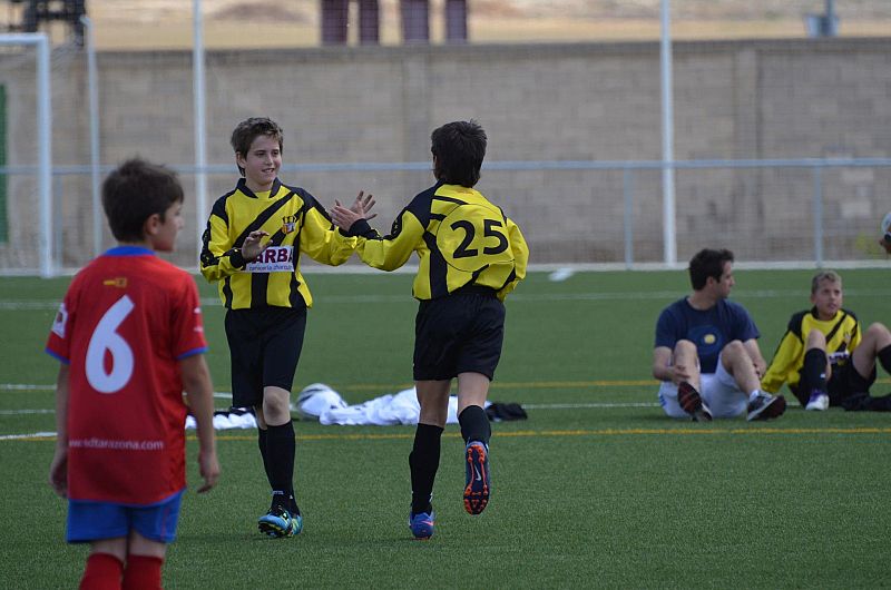 Alegria en el campo de futbol.