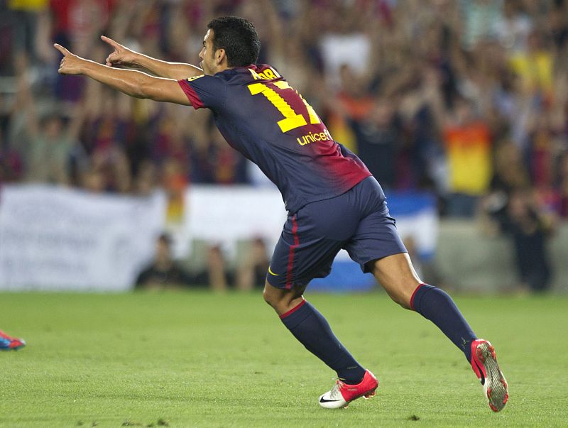 El delantero del FC Barcelona, Pedro Rodríguez, celebra su gol, primero de su equipo, durante el partido de ida de la Supercopa de España.