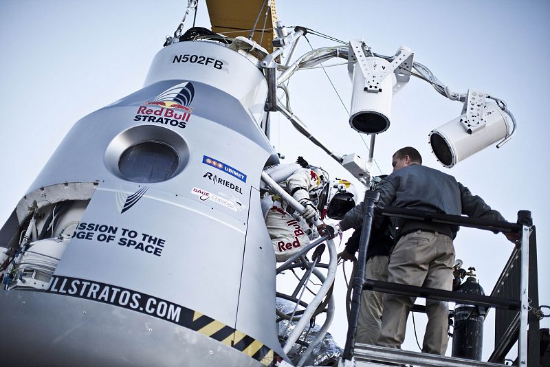 Handout photo of Pilot Felix Baumgartner of Austria stepping in to the capsule during the final manned flight for Red Bull Stratos in Roswell