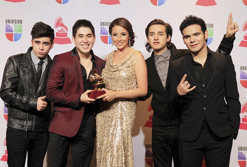 3Ball MTY pose backstage with their award for best new artist during the 13th Latin Grammy Awards in Las Vegas