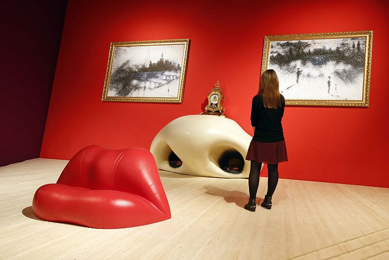 A visitor looks at the Rita Mae West room by Salvador Dali during a press visit of the exhibition "Dali" at the Centre Pompidou modern art museum in Paris