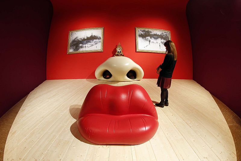 A visitor looks at the Rita Mae West room by Salvador Dali during a press visit of the exhibition "Dali" at the Centre Pompidou modern art museum in Paris