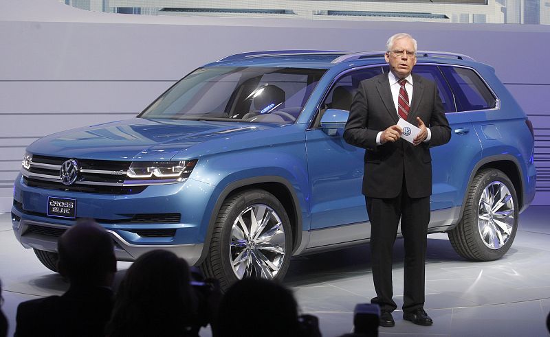 VW's Hackenberg speaks next to the 2014 Touran Cross Blue at the North American International Auto Show in Detroit