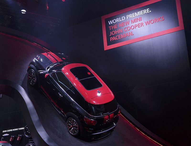 The 2014 Mini John Cooper Works Paceman is displayed on a ramp at the North American International Auto Show in Detroit