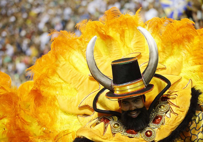 A reveller of the Unidos da Tijuca samba school participates in the annual carnival parade at Rio de Janeiro