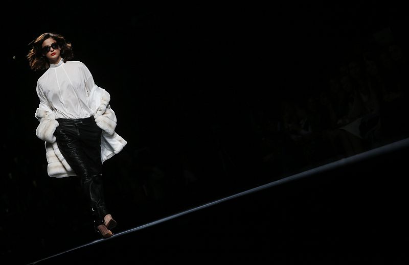 A model presents a creation from Roberto Torretta's Fall/Winter 2013 collection during the Mercedes-Benz Fashion Week in Madrid