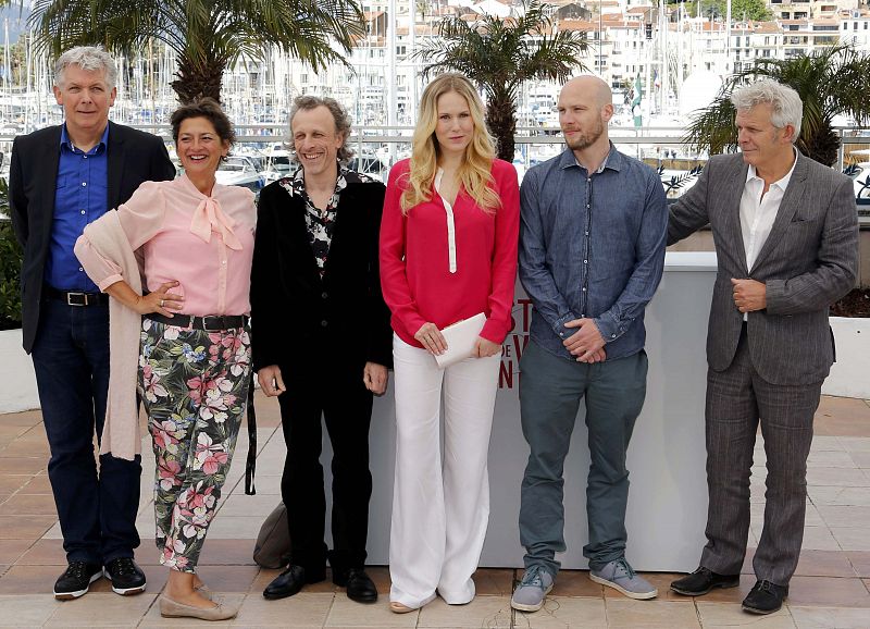 Director Alex van Warmerdam poses with cast members during a photocall for the film 'Borgman' at the 66th Cannes Film Festival