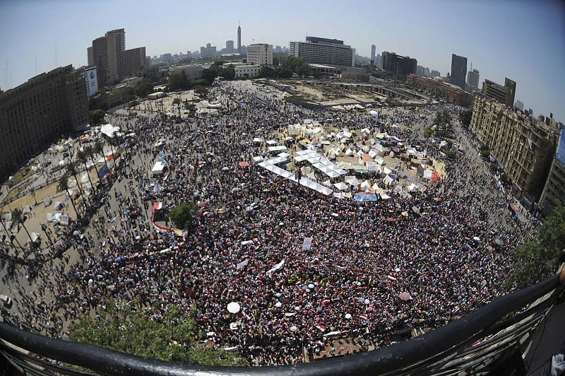 Protesters opposing Egyptian President Mursi demonstrate against him and brotherhood members during protest at Tahrir square in Cairo