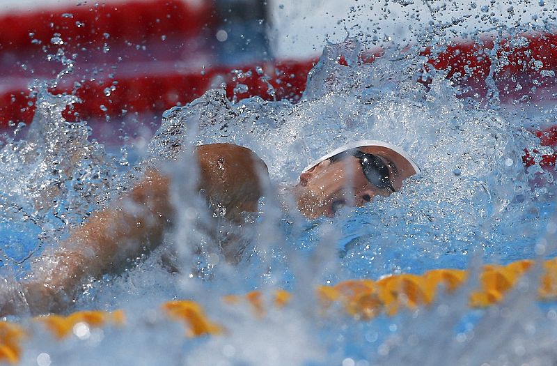 El nadador chino Geoffrey Robin Cheah compite en las preliminares de 100m libres masculinos de los Campeonatos del Mundo de Natación que se ha celebrado hoy, miércoles 31 de julio de 2013 en la piscina del Palau Sant Jordi de Barcelona.