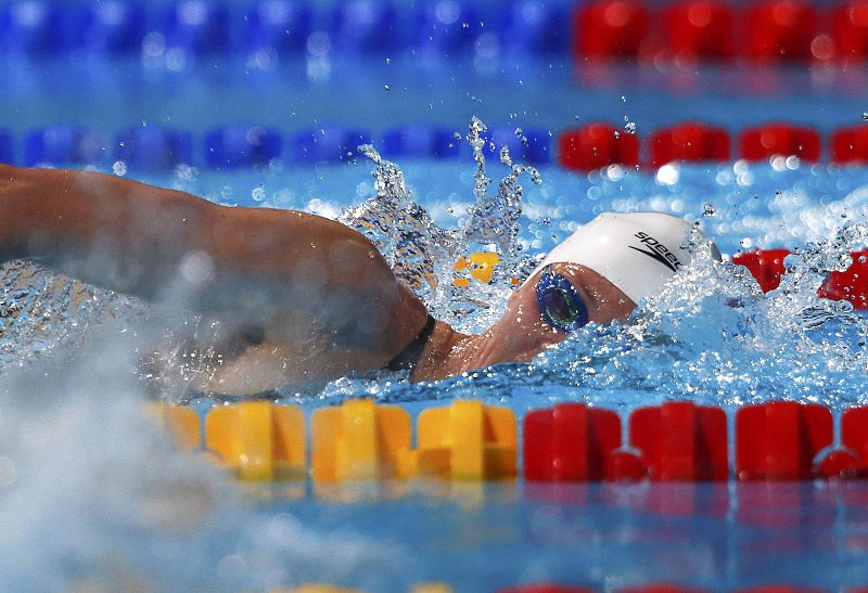 Britain's Carlin swims in the women's 800m freestyle heats during the World Swimming Championships in Barcelona