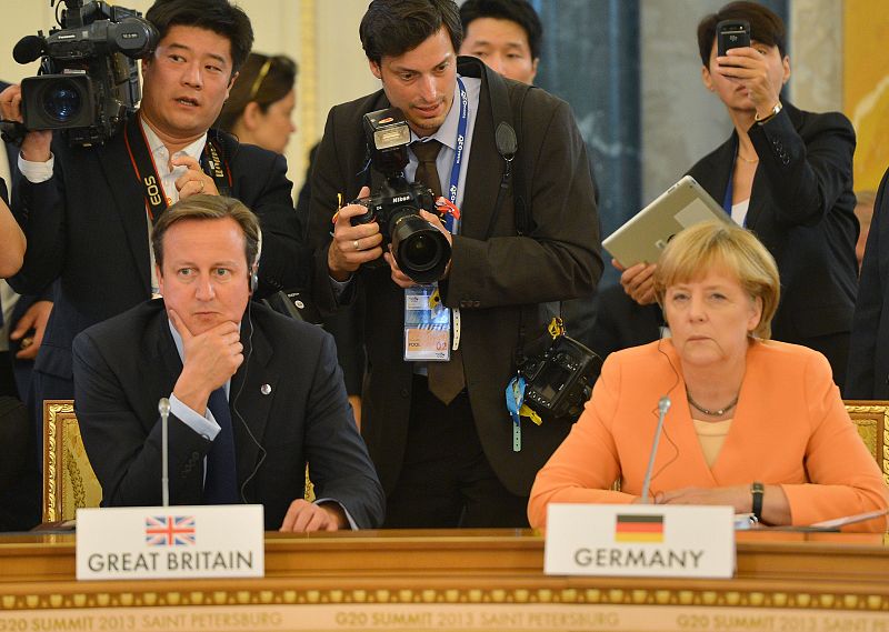 El primer ministro británico, David Cameron, junto a la canciller alemana, Angela Merkel