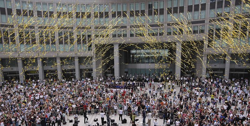 Golden confetti is set off into the air during an event celebrating Tokyo being chosen to host the 2020 Olympic Games, at Tokyo Metropolitan Government Building