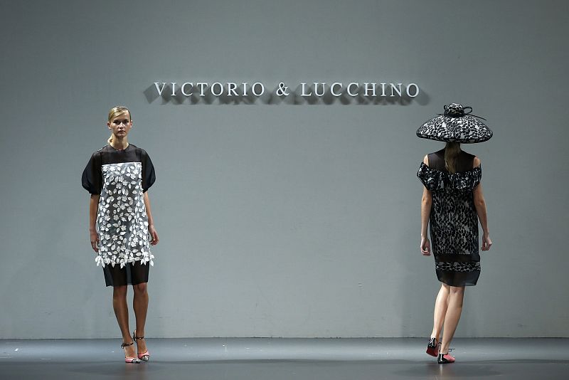 Models present creations from the Victorio & Lucchino's Spring/Summer 2014 collection during the Mercedes-Benz Fashion Week in Madrid