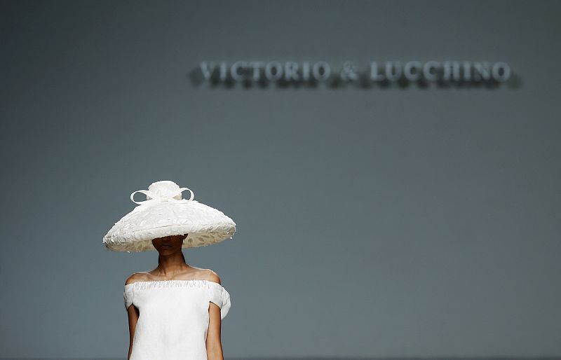 A model presents a creation from the Victorio & Lucchino's Spring/Summer 2014 collection during the Mercedes-Benz Fashion Week in Madrid