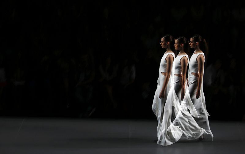 A model presents a creation by designer Amaya Arzuaga during the Mercedes-Benz Fashion Week in Madrid