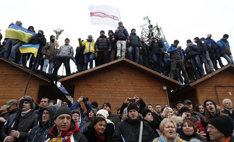 People attend a rally held by supporters of EU integration in Kiev