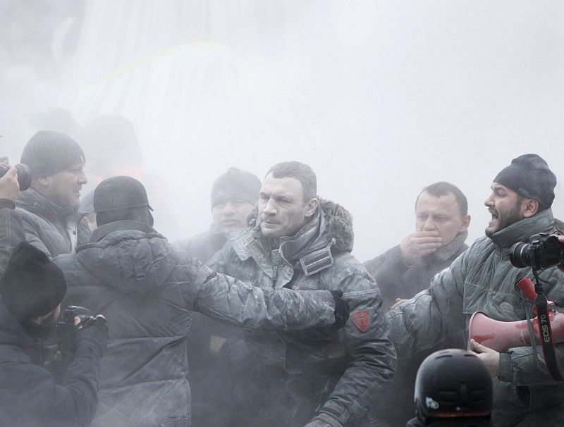 Opposition leader Klitschko reacts after he was sprayed with a powder fire extinguisher during a pro-European integration rally in Kiev