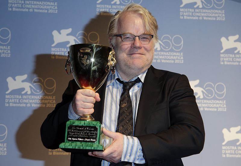 File photo of U.S. actor Philip Seymour Hoffman holding the Coppa Volpi for the Best Actor in the movie "The Master" at the 69th Venice Film Festival in Venice