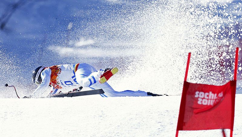 Romania's Achiriloaie crashes during the downhill run of the men's alpine skiing super combined event at the 2014 Sochi Winter Olympics