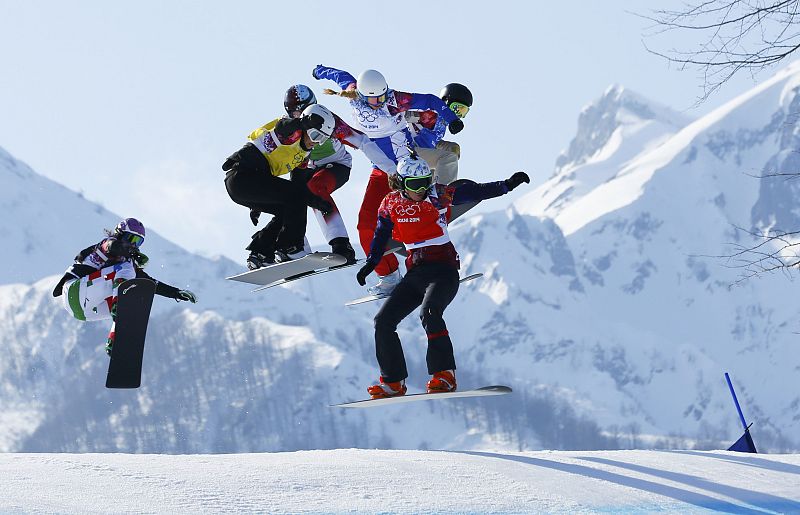 Italy's Moiolim, Bulgaria's Jekova, Canada's Maltais, France's Trespeuch, Samkova of the Czech Republic and Gulini of the U.S. compete during the women's snowboard cross finals at the 2014 Sochi Winter Olympic Games in Rosa Khutor