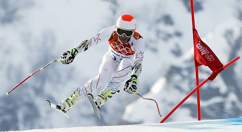 Miller of the U.S. takes a jump during the men's alpine skiing Super-G competition at the 2014 Sochi Winter Olympics