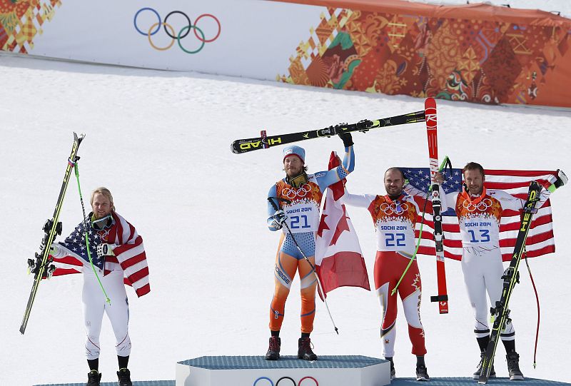 Norway's winner Jansrud, second-placed Weibrecht of the U.S. and joint third-placed Miller of the U.S. and Canada's Hudec pose on podium after the men's alpine skiing Super-G competition during the 2014 Sochi Winter Olympics