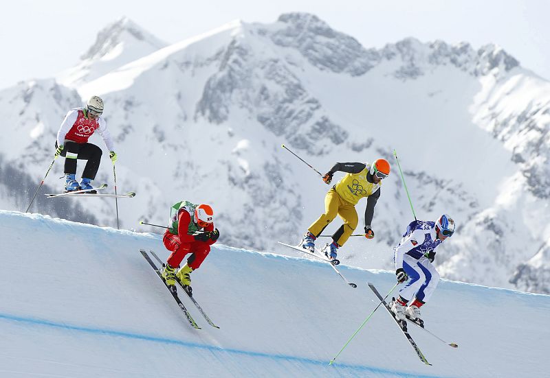 Slovenia's Flisar, Switzerland's Niederer, Norway's Lie and Russia's Korotkov compete during the men's freestyle skiing skicross small final round at the 2014 Sochi Winter Olympic Games in Rosa Khutor