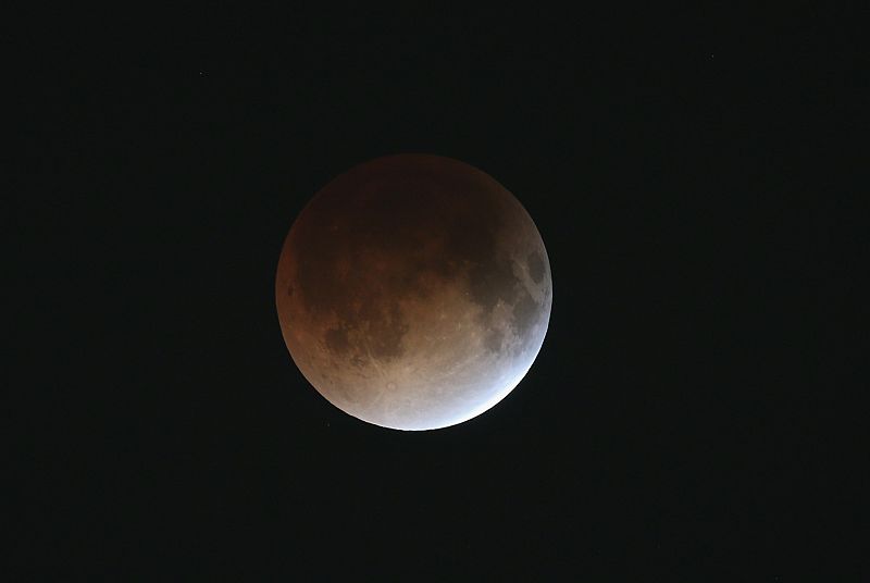 Rare Lunar Eclipse Cast Red Cast Over Moon