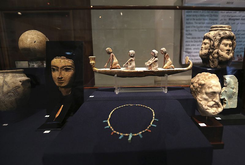 Artefacts are seen on display during the inauguration of an exhibition of repatriated historical objects at the Egyptian Museum in Cairo