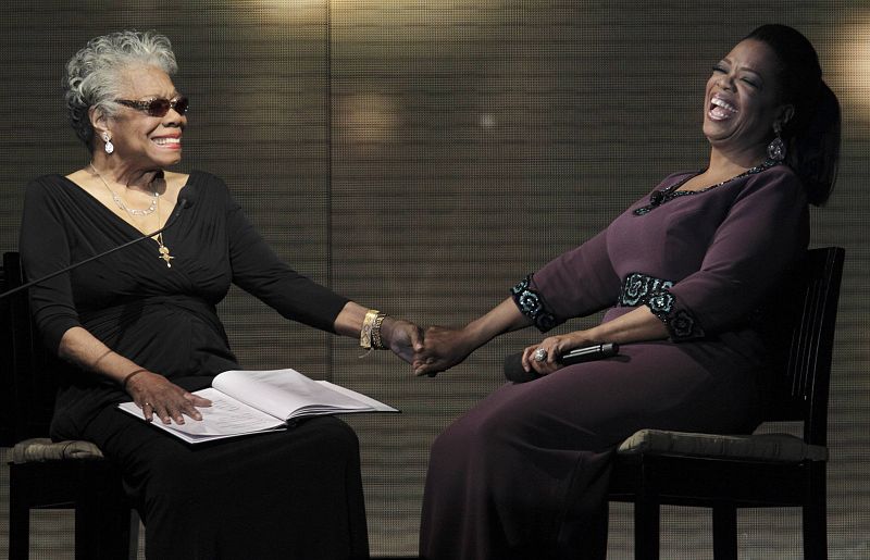 File photo of Oprah Winfrey with poet Maya Angelou during the taping of Oprah's Surprise Spectacular in Chicago