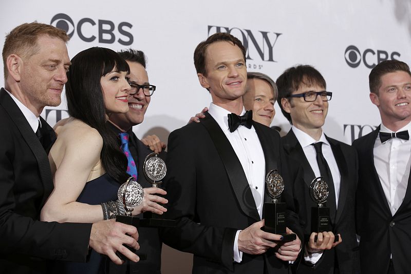 The cast and crew of "Hedwig and the Angry Inch" pose together backstage at the Tony Awards at Radio City Music Hall in New York