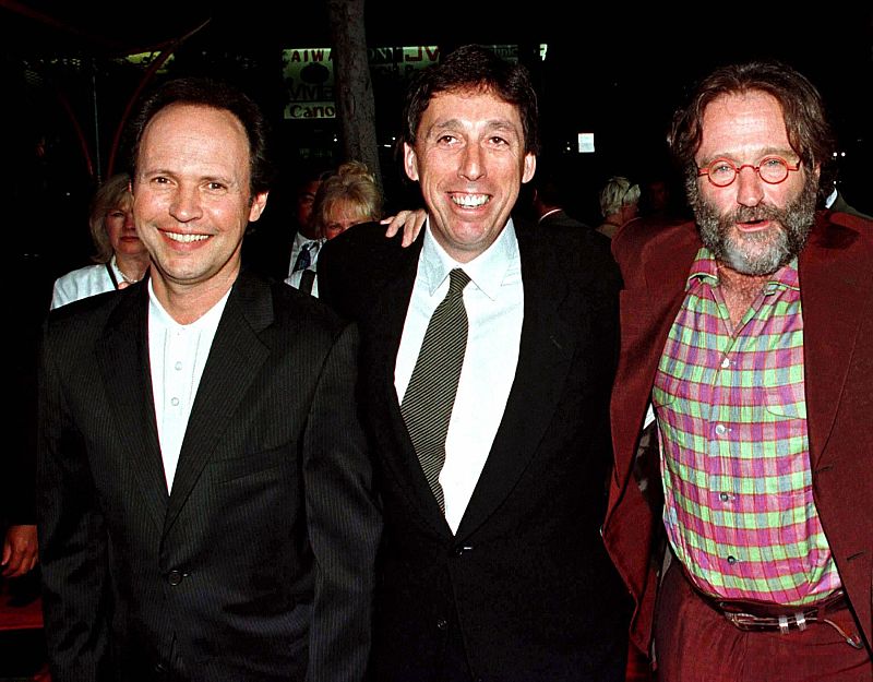 File photo of Hollywood director Ivan Reitman posing with Robin Williams and Billy Crystal at Mann's Chinese Theatre in Hollywood