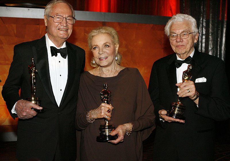 File photo of actress Lauren Bacall, cinematographer Willis and filmmaker Corman posing with their Honorary Oscars at the Academy of Motion Picture Arts & Sciences 2009 Governors Awards in Hollywood