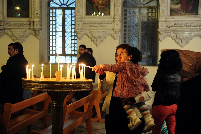 Cristianos sirios en una iglesia de Damasco