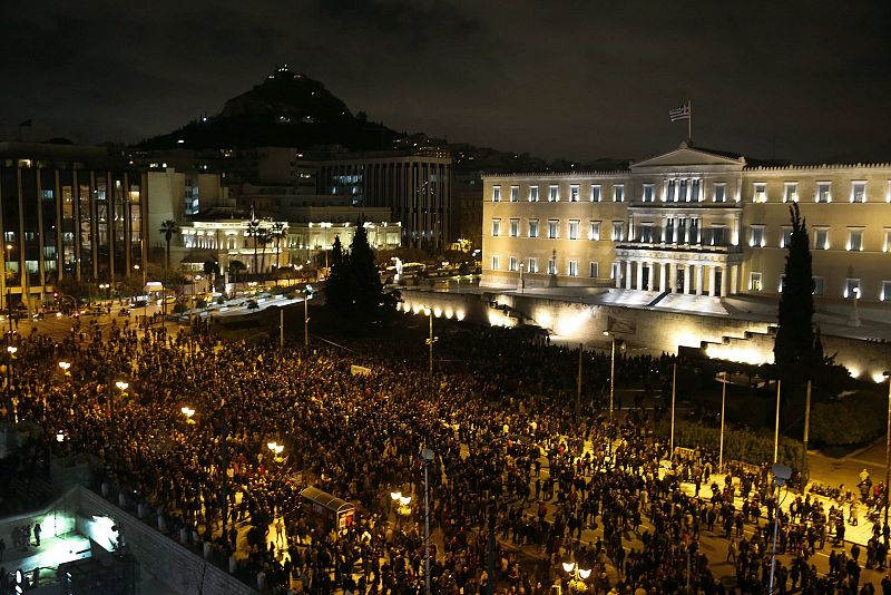 People gather for an anti-austerity demonstration outside the Greek parliament in Athens