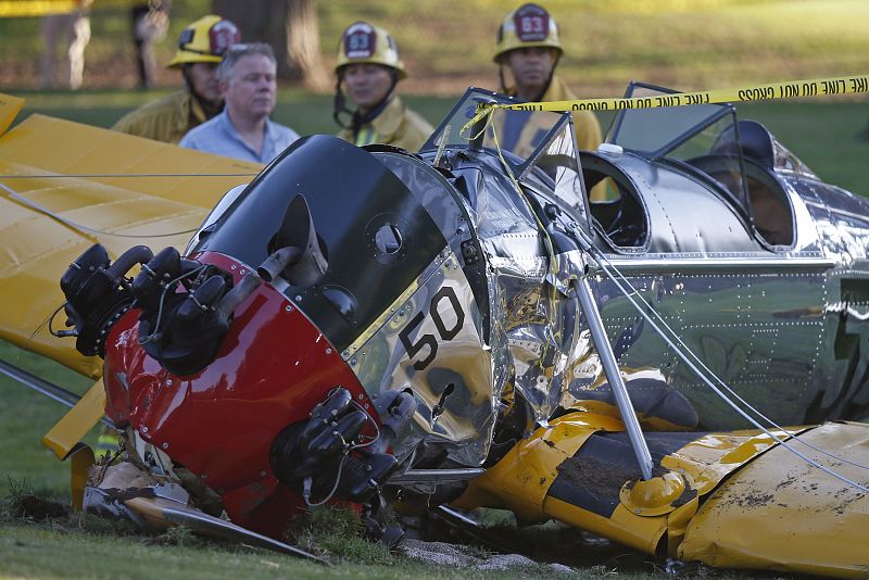 An airplane sits on the ground after crash landing at Penmar Golf Course in Venice, Los Angeles CA