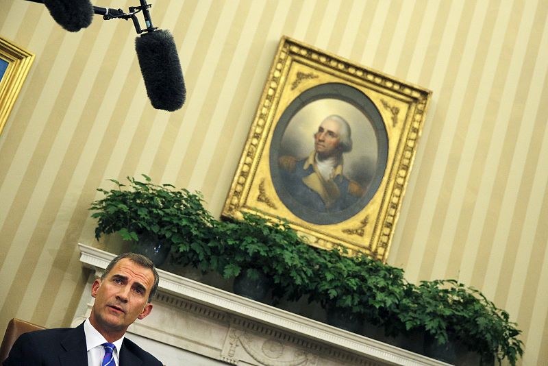 Spain's King Felipe VI talks to the reporters during a meeting with U.S. President Barack Obama  at the White House in Washington