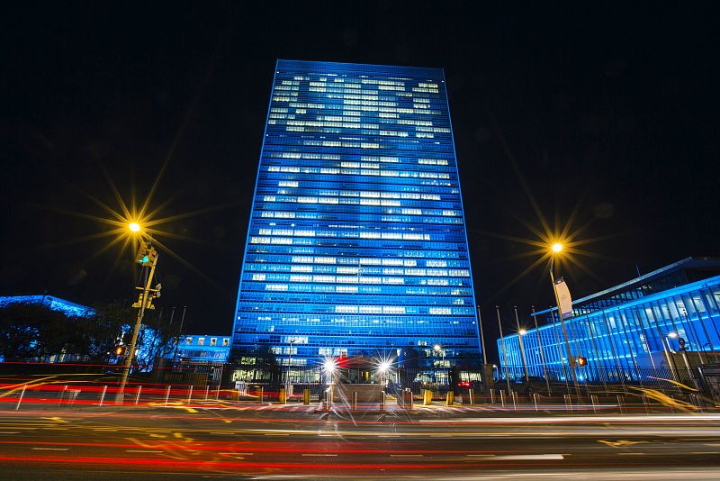 U.N. headquarters is lit up in blue to honor the 70th anniversary of the United Nations in New York