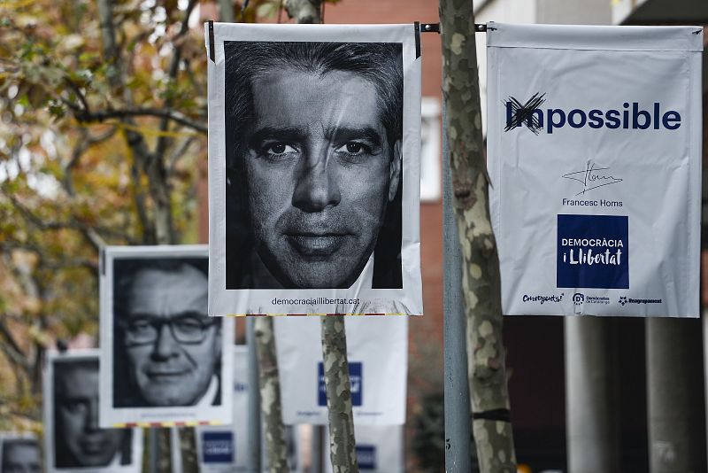 Carteles del candidato de Democràcia i Llibertat, Francesc Homs, y del líder de CDC, Artur Mas.