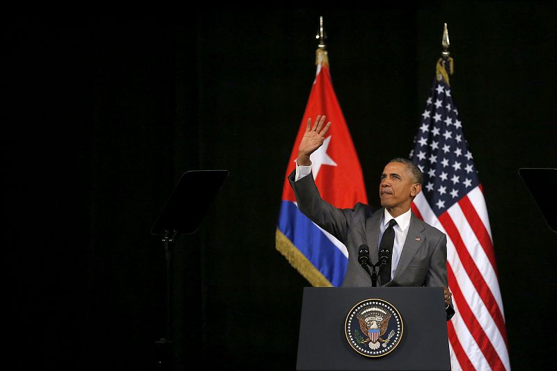 U.S. President Barack Obama waves as he arrives to deliver a speech at the Gran Teatro in Havana, Cuba