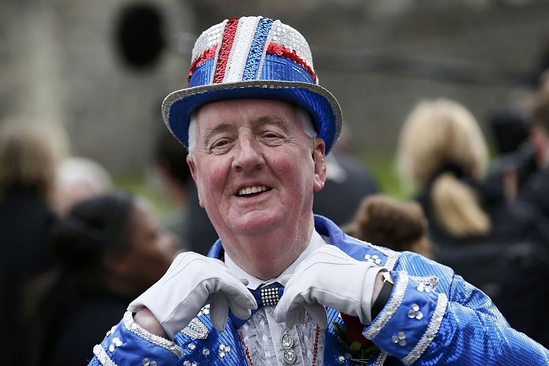 A royal fan gathers to celebrate Queen Elizabeth's 90th birthday in Windsor