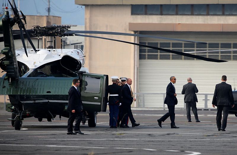 U.S. President Barack Obama gets off from helicopter at airfield near Hiroshima Peace Memorial Park and Museum in Hiroshima, Japan