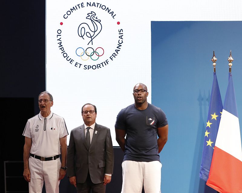 El presidente francés junto al judoka Teddy Riner