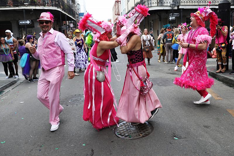 People celebrate Mardi Gras at the French Quarter in New Orleans, Louisiana