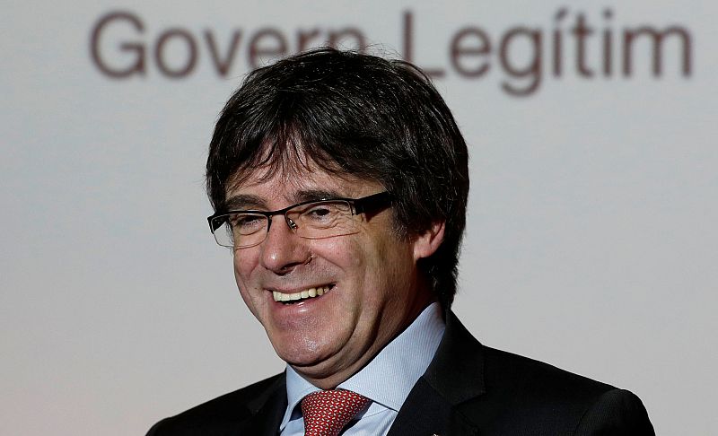 Catalonia's former President Carles Puigdemont speaks during a press conference in Brussels