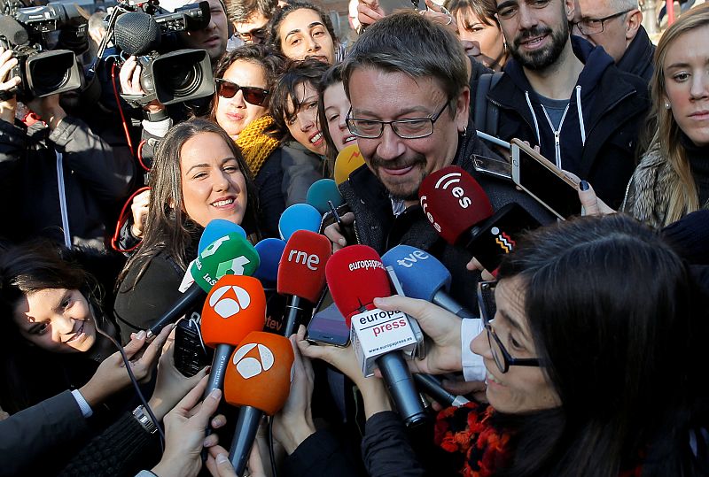 En Comu Podem leader Xavier Domenech speaks to journalists after voting in Catalonia's regional elections at a polling station in Barcelona