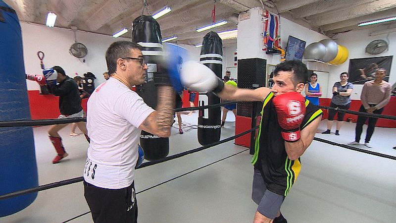 Isaac y el entrenador en el ring